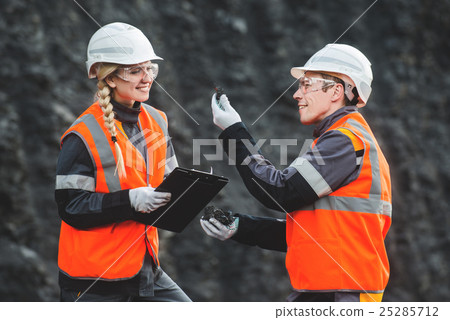 Workers with coal at open pit Workers with coal at open pit 25285712