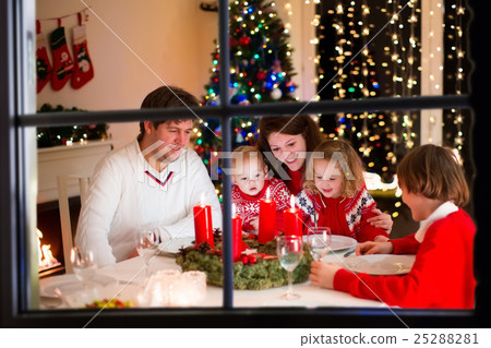 Family at Christmas dinner at home 25288281
