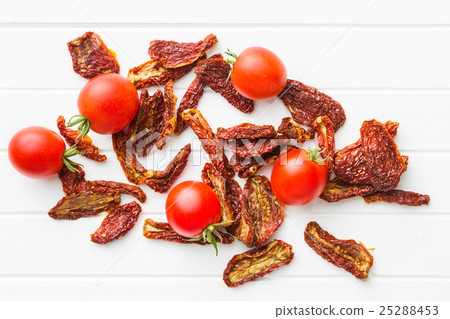 Fresh and dried tomatoes. Fresh and dried tomatoes. 25288453