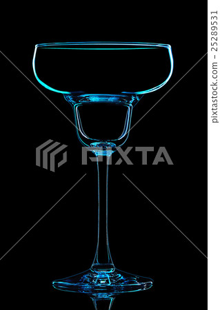 Silhouette of blue margarita glass on black 25289531