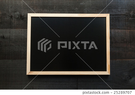 Empty chalkboard on wooden background Empty chalkboard on wooden background 25289707