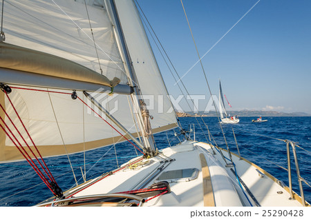 Sailing boat going fast on she's sails, view from Sailing boat going fast on she's sails, view from 25290428