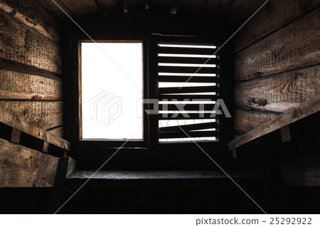 Attic window with shutters in old wooden interior 25292922