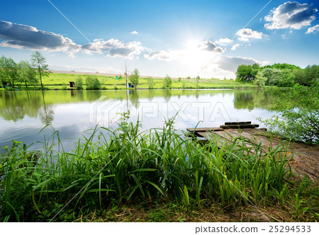 Fishing pier on river Fishing pier on river 25294533