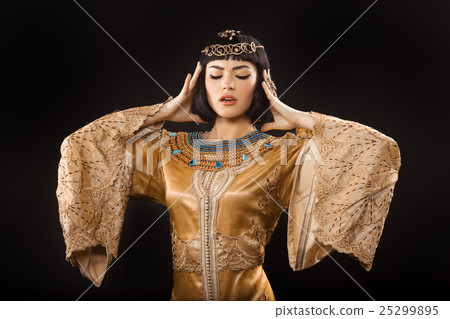 Serious Egyptian woman like Cleopatra with 25299895