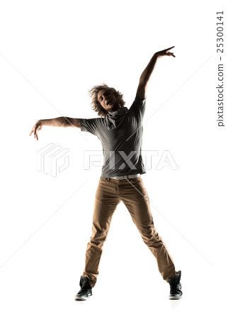 Modern style dancer posing on studio background 25300141