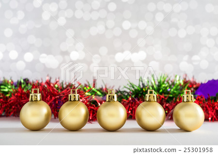 Golden balls and Christmas decorations with lights 25301958