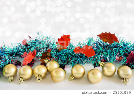 Golden balls and Christmas decorations with lights 25301959