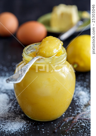 Jar with lemon custard, lemon, egg. Jar with lemon custard, lemon, egg. 25303046