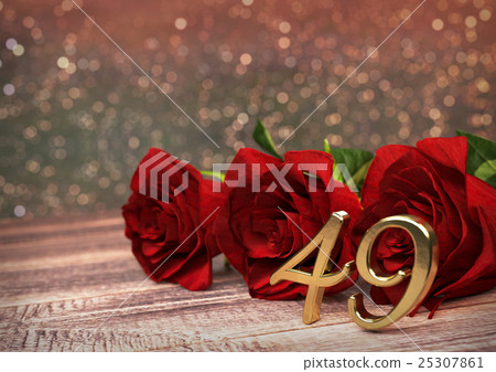 birthday concept with red roses on wooden desk 25307861