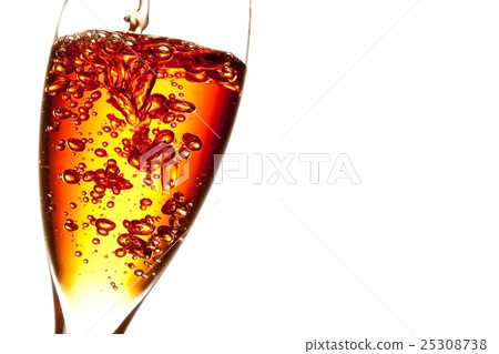one glass being filled of red cocktail with space for text 25308738
