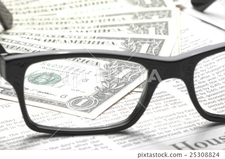 detail of dollars on business newspaper 25308824