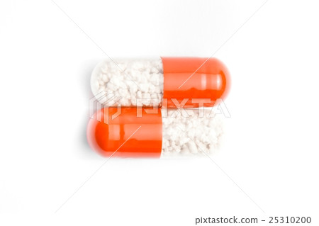 two medical pills isolated 25310200
