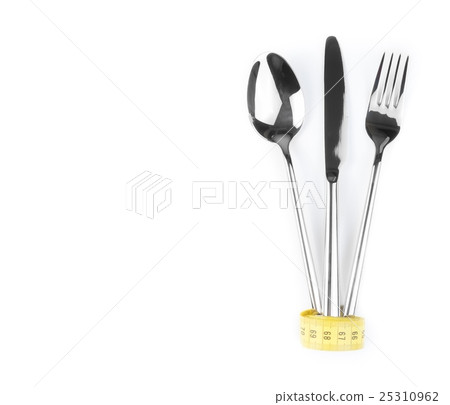 top of view of measuring tape near spoon, knife and fork, concept of nutrition and diet top of view of measuring tape near spoon, knife and fork, concept of nutrition and diet 25310962