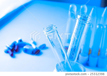 detail of test tubes in laboratory near pills detail of test tubes in laboratory near pills 25312398