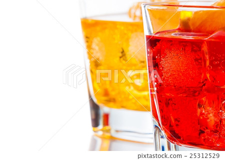 red and yellow cocktail with orange slice isolated on white background red and yellow cocktail with orange slice isolated on white background 25312529