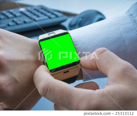 business man using his smartwatch app with chroma key green screen, new technology concept business man using his smartwatch app with chroma key green screen, new technology concept 25313112