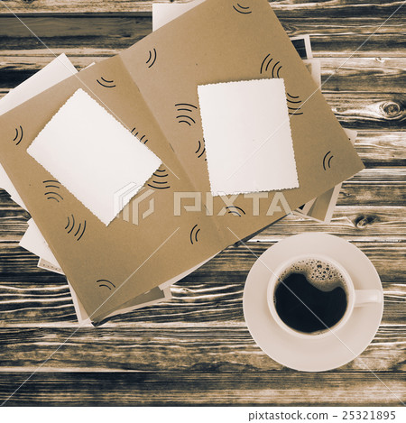 Coffee cup and album Coffee cup and album 25321895