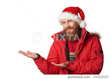 bright picture of handsome man in christmas hat. bright picture of handsome man in christmas hat. 25323327
