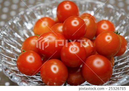 How about a fresh mini tomato? 25326785