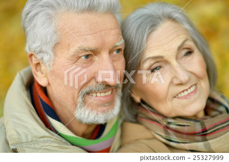 Senior couple in autumn park Senior couple in autumn park 25327999
