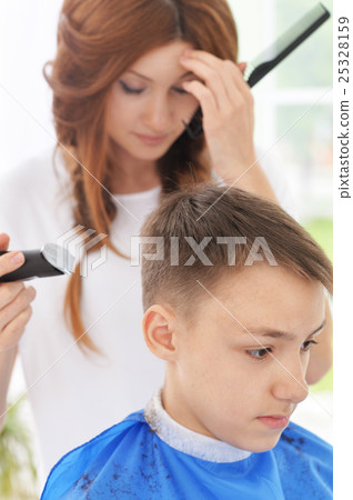boy getting haircut boy getting haircut 25328159