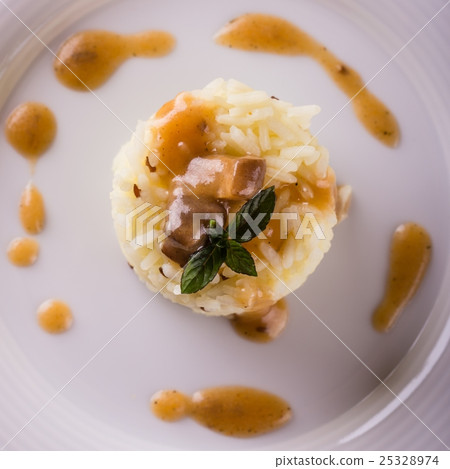 Top view on sesame curry rise with mushroom sauce Top view on sesame curry rise with mushroom sauce 25328974