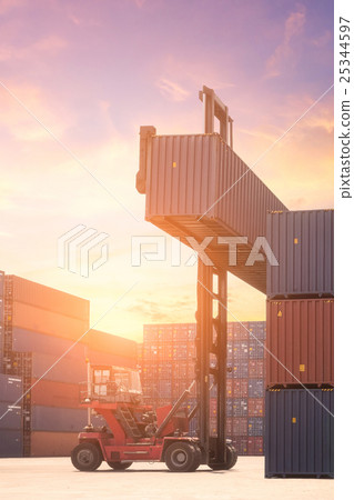 Forklift truck lifting cargo container 25344597