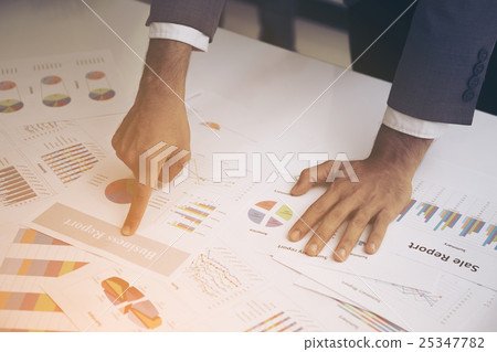 Businesspeople having a discussion about financial Businesspeople having a discussion about financial 25347782