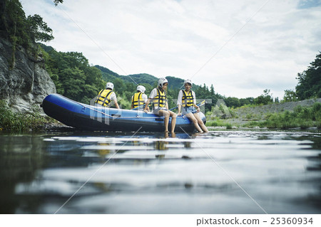 Men and women enjoying rafting Men and women enjoying rafting 25360934