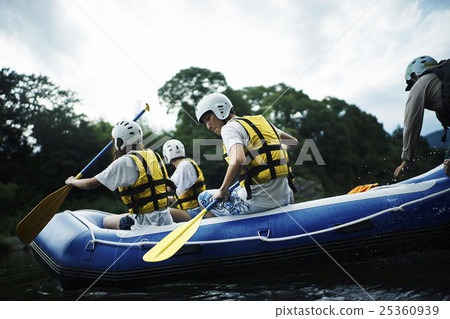Men and women enjoying rafting Men and women enjoying rafting 25360939
