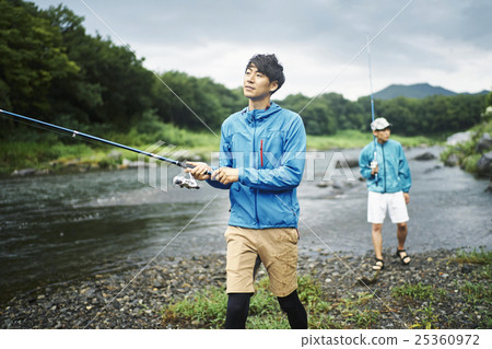 A man who enjoys fly fishing A man who enjoys fly fishing 25360972