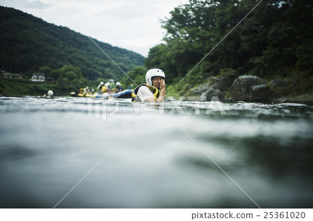 Men enjoying the river 25361020