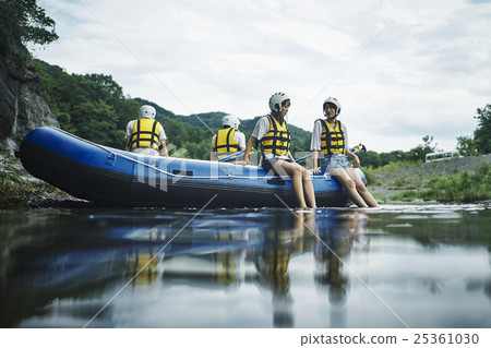 Men and women enjoying rafting Men and women enjoying rafting 25361030
