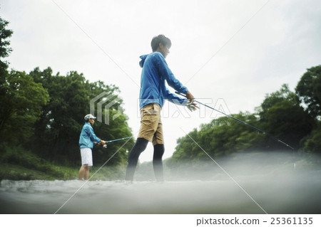 A man who enjoys fly fishing A man who enjoys fly fishing 25361135