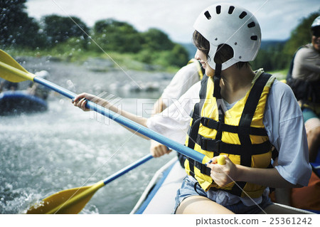 Men and women enjoying rafting Men and women enjoying rafting 25361242