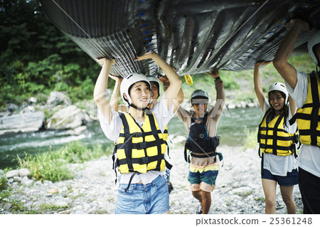 Men and women enjoying rafting Men and women enjoying rafting 25361248