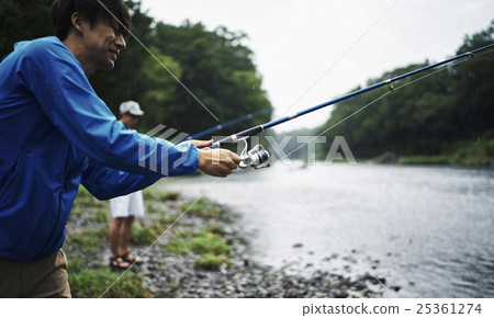 A man who enjoys fly fishing 25361274