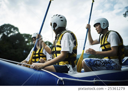 Men and women enjoying rafting Men and women enjoying rafting 25361279