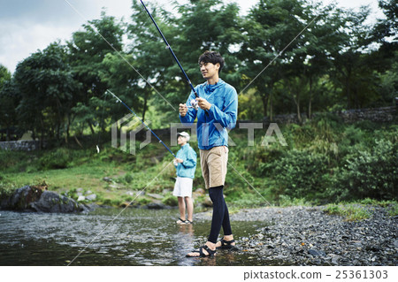 A man who enjoys fly fishing 25361303