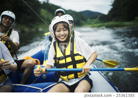 Men and women enjoying rafting Men and women enjoying rafting 25361385