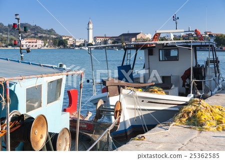 Colorful wooden fishing boats in Greek port 25362585