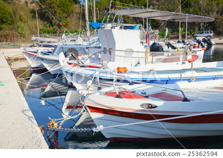 White Greek wooden fishing boats White Greek wooden fishing boats 25362594