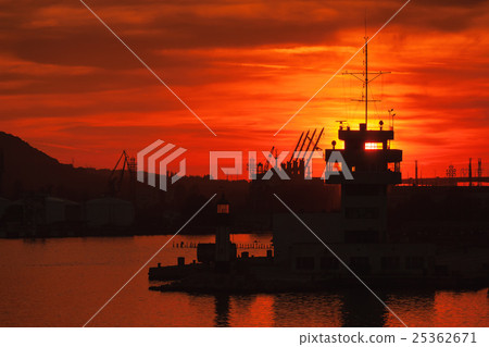 Cranes and buildings of Varna port at sunset Cranes and buildings of Varna port at sunset 25362671