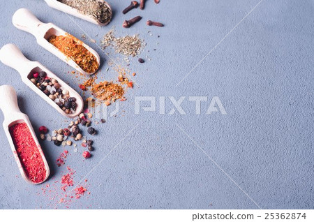 Aromatic spices on wooden spoons. Aromatic spices on wooden spoons. 25362874