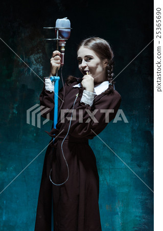 Portrait of a young girl in school uniform as a 25365690