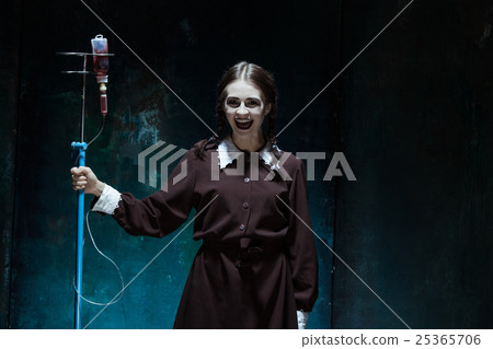 Portrait of a young girl in school uniform as a 25365706