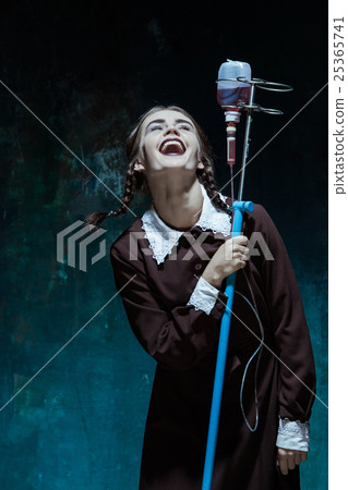 Portrait of a young girl in school uniform as a 25365741