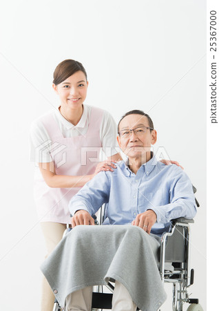 Caregiver women and wheelchair men Caregiver women and wheelchair men 25367000