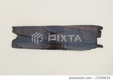 old wood board on a beach 25369654